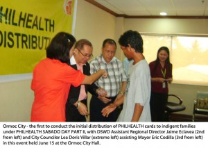 Ormoc City - the first to conduct the initial distribution of PHILHEALTH cards to indigent families under PHILHEALTH SABADO DAY PART II, with DSWD Assistant Regional Director Jaime Eclavea (2nd from left) and City Councilor Lea Doris Villar (extreme left) assisting Mayor Eric Codilla (3rd from left) in this event held June 15 at the Ormoc City Hall.