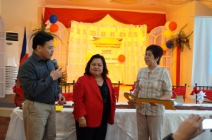 Director Remia Tapispisan (middle) is all smiles as she listens to the talk of Undersecretary Camilo Gudmalin (left), before Director Leticia Diokno (right) turns over the key of responsibility to her.