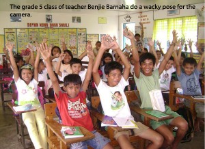 The Grade 5 class of teacher Benjie Barnaha do a wacky pose for the camera.
