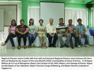 Regional Director Leticia Corillo (4th from left) and Assistant Regional Director Jaime Eclavea (5th from left) are flanked by the mayors of the new KALAHI-CIDSS municipalities of Samar Province. (L-R) Mayors Melissa de la Cruz of Matuginao, Lilia Conejos of Sto. Nino, Lucia Astorga of Daram, Arnold Abalos of San Sebastian, Francisco Langi of Motiong, and Vicente Limpiado of Tagapul-an.