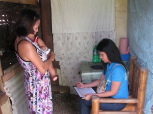 NHTS-PR staff and her interviewee during the special enumeration in Brgy. Lomonon, Palompon, Leyte.