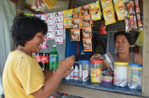 Vilma tends her sari-sari store.