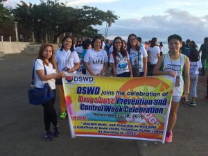 In photo, Protective Services Unit Head Ofelia Onida Pagay (second from left) heads the DSWD team in the formal opening of the Drug Abuse Prevention Week Sunday, Nov. 13, 2016 in Tacloban.